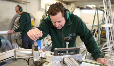 Man making a Double Glazed Window at Chelworth Windows